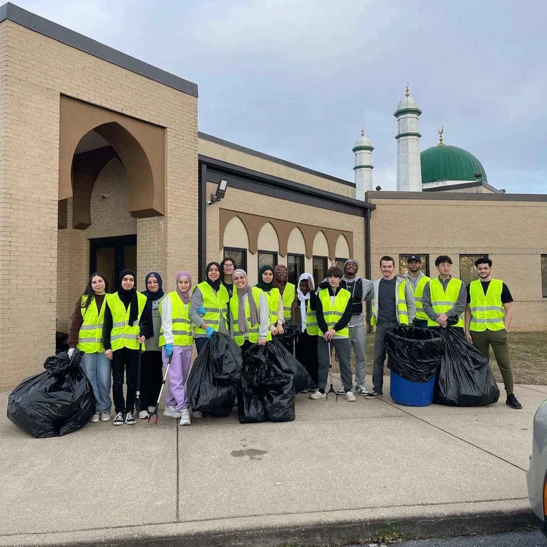 MMY youth volunteers in safety vests during a 30 Days of Giving service project