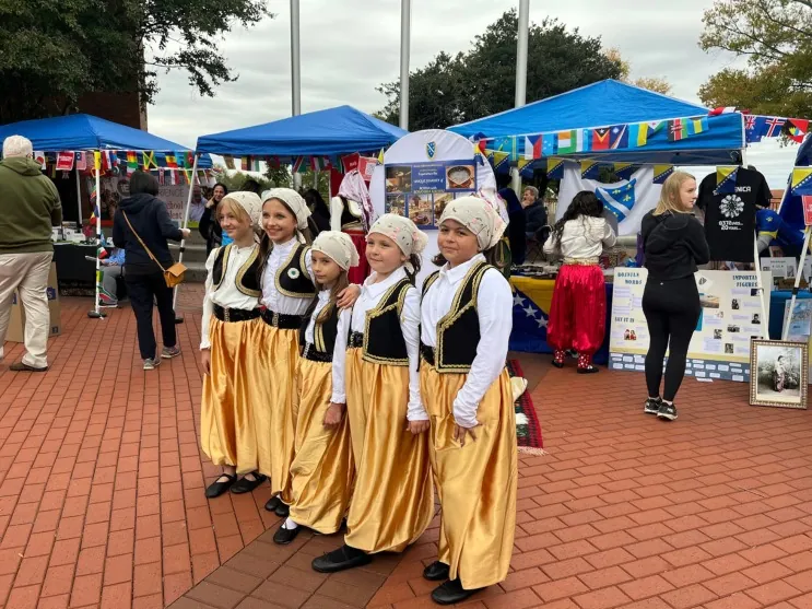 Performers in traditional dress at Love Your Neighbor in downtown Murfreesboro