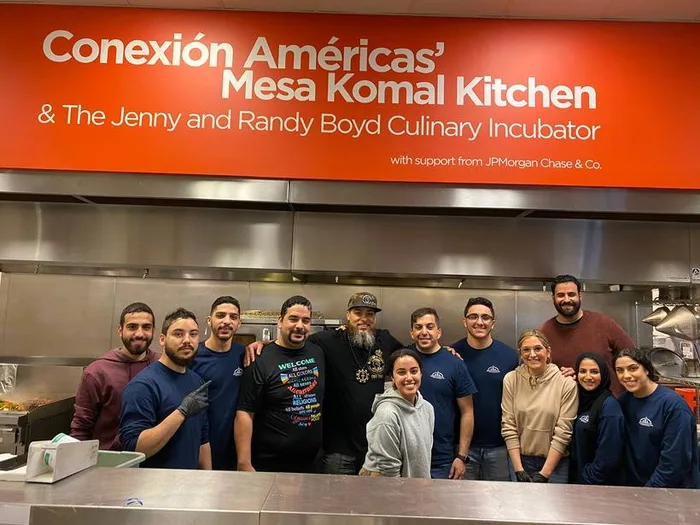 MMY volunteers at a community kitchen partnership