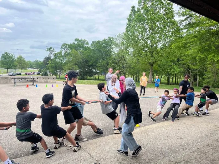 MMY youth playing tug-of-war